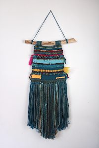 Woven wall hanging by Florence Ancillotti
