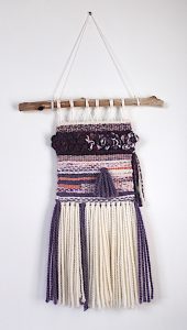 Woven wall hanging by Florence Ancillotti